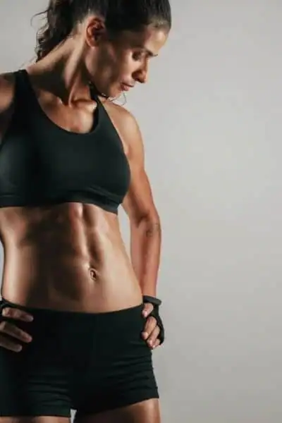 Toning Up at Home: The Ultimate Guide to Bodyweight Exercises 2 Image of woman's toned stomach after bodyweight exercises Addlestone and non-surgical treatment from Lipo 360