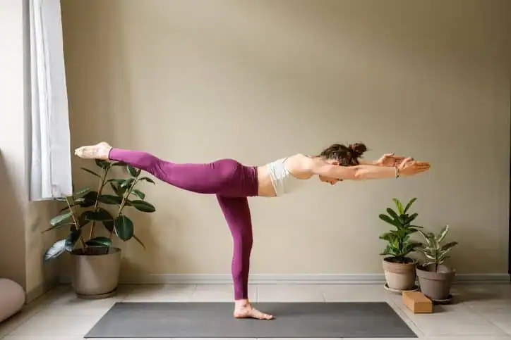 Achieving the Perfect Tone: How Often Should You Exercise for Results? 1 Woman doing Yoga exercise Addlestone to help with toning the body.