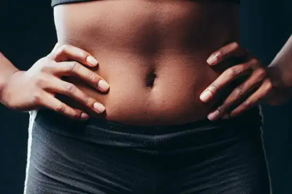 Toning Your Stomach: The Ultimate Guide to Achieving a Sculpted Stomach While Shedding Pounds 1 Image of a toned stomach after non surgical treatment Addlestone